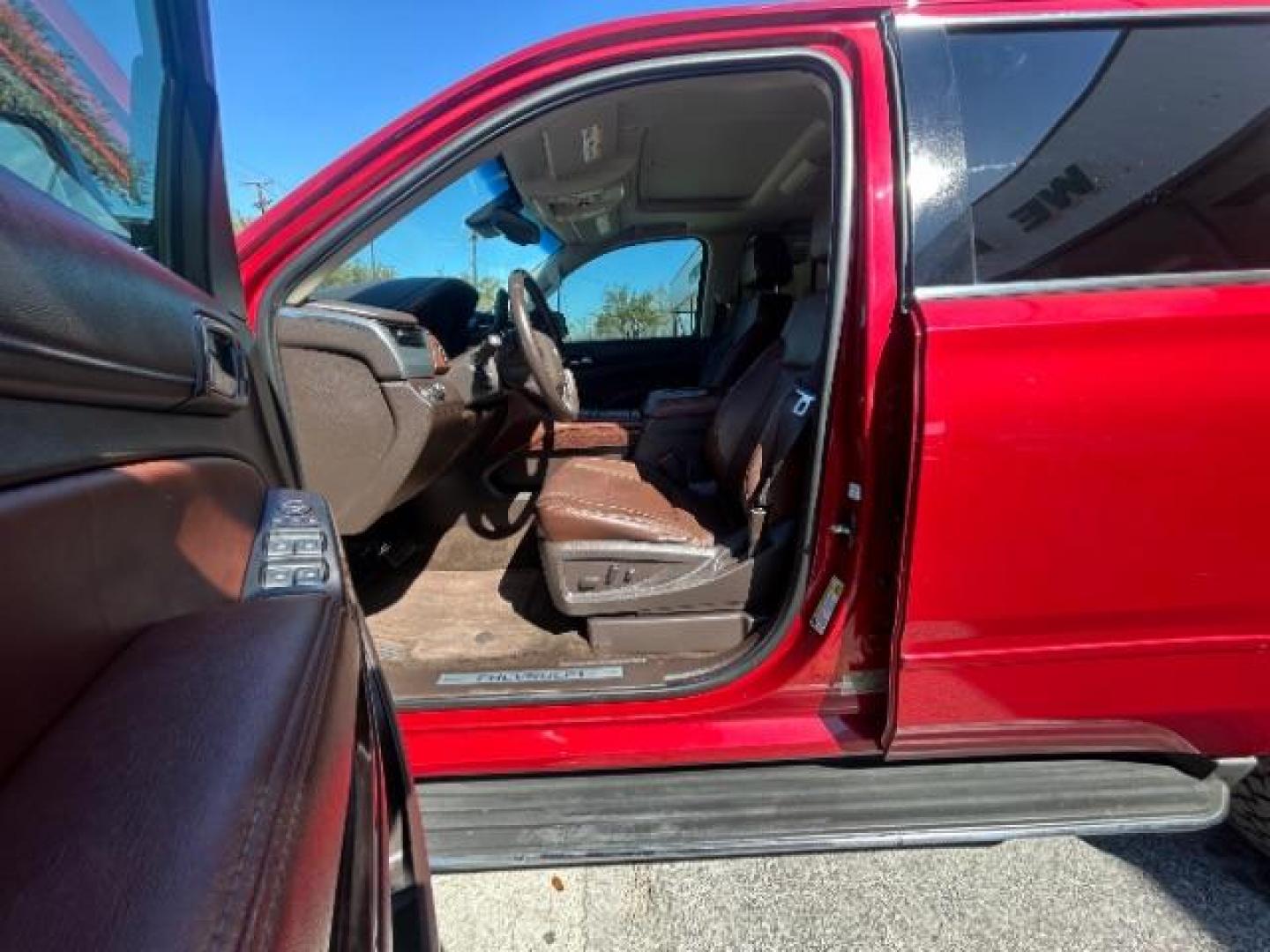 2015 Red Chevrolet Tahoe LTZ 2WD (1GNSCCKC7FR) with an 5.3L V8 OHV 16V engine, 6-Speed Automatic transmission, located at 12182 Garland Rd, Dallas, TX, 75218, (214) 521-2040, 0.000000, 0.000000 - Photo#17