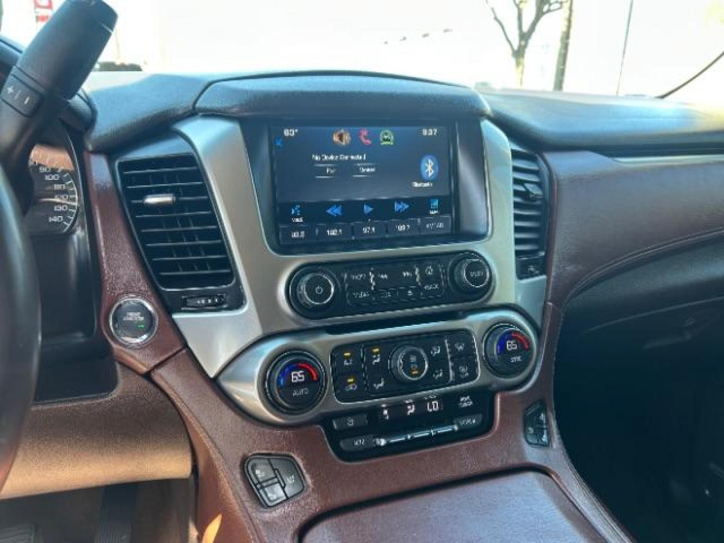 2015 Red Chevrolet Tahoe LTZ 2WD (1GNSCCKC7FR) with an 5.3L V8 OHV 16V engine, 6-Speed Automatic transmission, located at 12182 Garland Rd, Dallas, TX, 75218, (214) 521-2040, 0.000000, 0.000000 - Photo#19