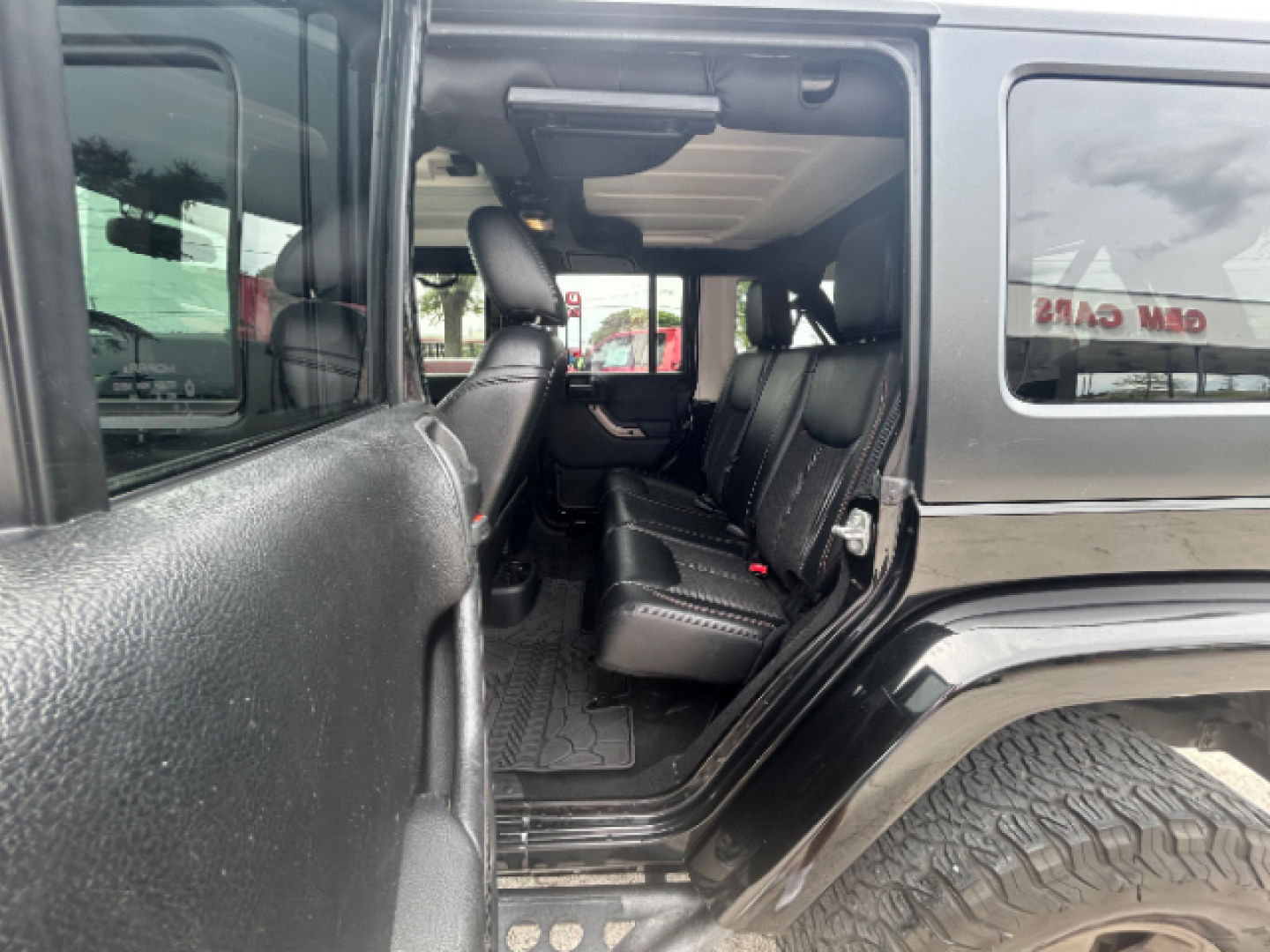 2017 Black Clear Coat Jeep Wrangler Unlimited Sahara 4WD (1C4BJWEG7HL) with an 3.6L V6 DOHC 24V FFV engine, located at 12182 Garland Rd, Dallas, TX, 75218, (214) 521-2040, 0.000000, 0.000000 - Photo#11
