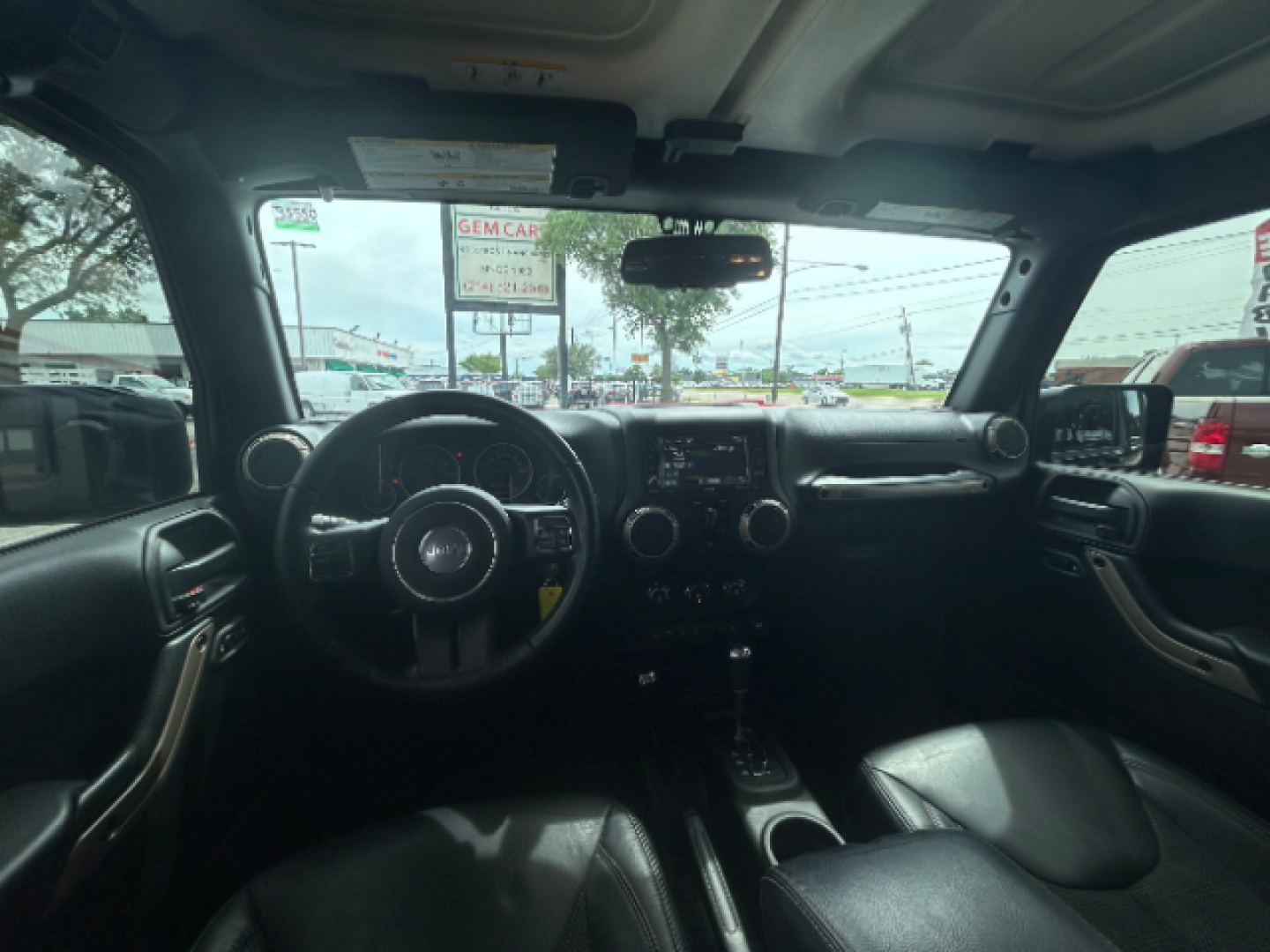 2017 Black Clear Coat Jeep Wrangler Unlimited Sahara 4WD (1C4BJWEG7HL) with an 3.6L V6 DOHC 24V FFV engine, located at 12182 Garland Rd, Dallas, TX, 75218, (214) 521-2040, 0.000000, 0.000000 - Photo#12