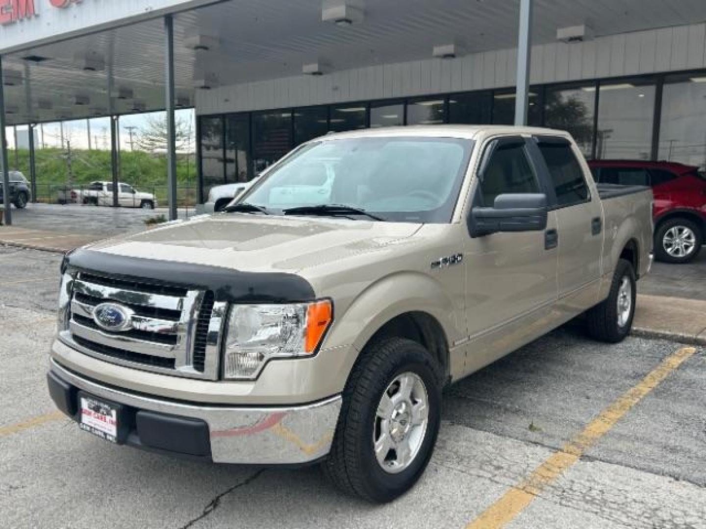 2009 Pueblo Gold Metallic /EBONY ACTIVEX SEAT MATERIAL Ford F-150 XLT SuperCrew 5.5-ft (1FTRW12879F) with an 4.6L V8 engine, Automatic transmission, located at 12182 Garland Rd, Dallas, TX, 75218, (214) 521-2040, 0.000000, 0.000000 - Photo#2