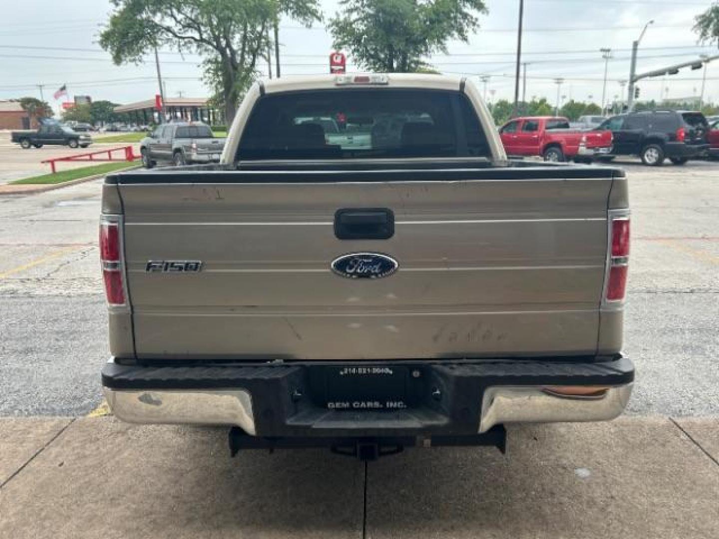2009 Pueblo Gold Metallic /EBONY ACTIVEX SEAT MATERIAL Ford F-150 XLT SuperCrew 5.5-ft (1FTRW12879F) with an 4.6L V8 engine, Automatic transmission, located at 12182 Garland Rd, Dallas, TX, 75218, (214) 521-2040, 0.000000, 0.000000 - Photo#3