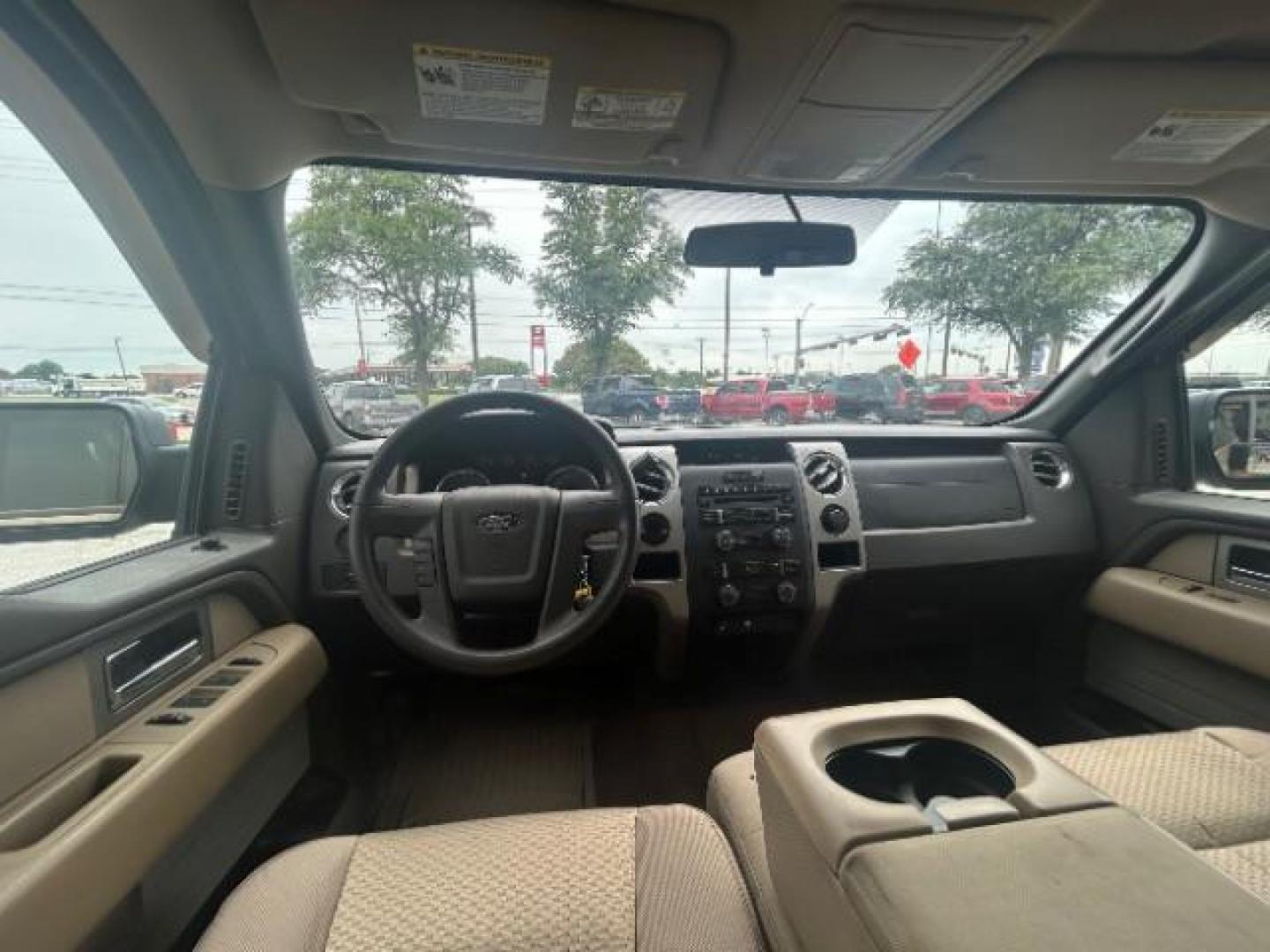 2009 Pueblo Gold Metallic /EBONY ACTIVEX SEAT MATERIAL Ford F-150 XLT SuperCrew 5.5-ft (1FTRW12879F) with an 4.6L V8 engine, Automatic transmission, located at 12182 Garland Rd, Dallas, TX, 75218, (214) 521-2040, 0.000000, 0.000000 - Photo#11