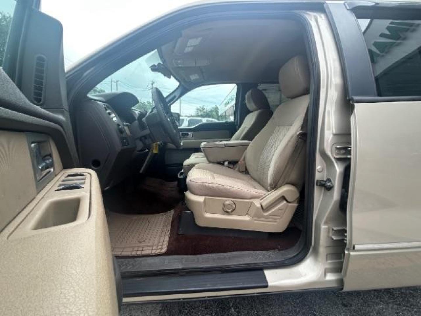 2009 Pueblo Gold Metallic /EBONY ACTIVEX SEAT MATERIAL Ford F-150 XLT SuperCrew 5.5-ft (1FTRW12879F) with an 4.6L V8 engine, Automatic transmission, located at 12182 Garland Rd, Dallas, TX, 75218, (214) 521-2040, 0.000000, 0.000000 - Photo#12