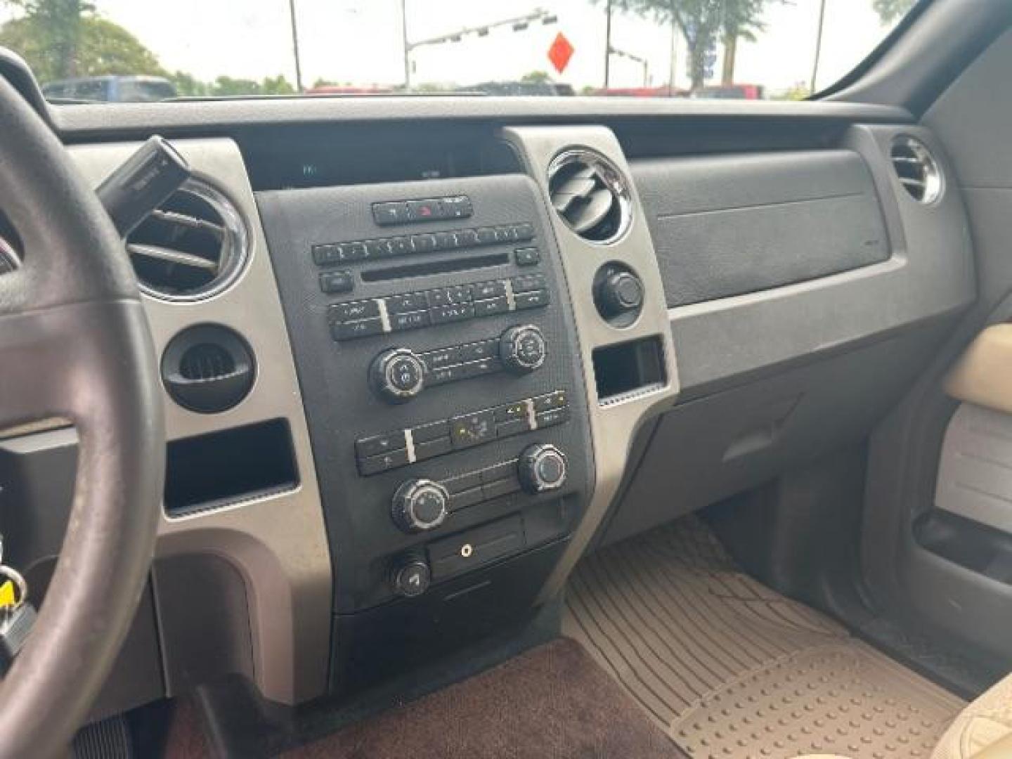 2009 Pueblo Gold Metallic /EBONY ACTIVEX SEAT MATERIAL Ford F-150 XLT SuperCrew 5.5-ft (1FTRW12879F) with an 4.6L V8 engine, Automatic transmission, located at 12182 Garland Rd, Dallas, TX, 75218, (214) 521-2040, 0.000000, 0.000000 - Photo#14