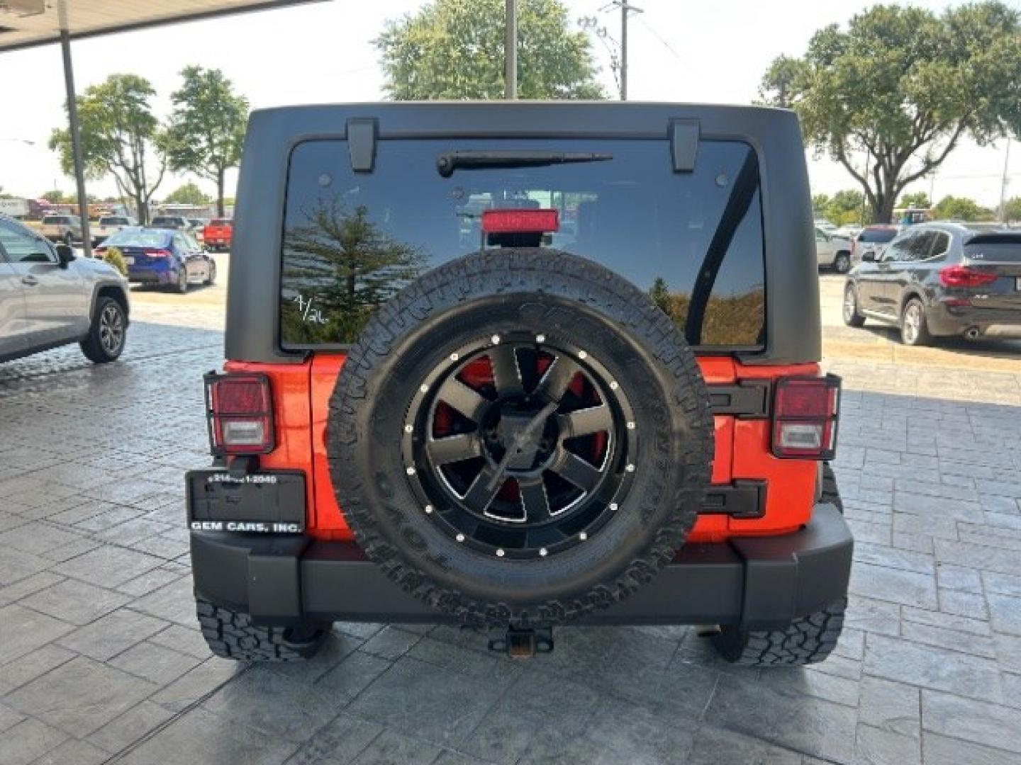 2015 Orange /Black Leather Interior Jeep Wrangler Unlimited Sport 4WD (1C4BJWDG4FL) with an 3.6L V6 DOHC 24V FFV engine, 5-Speed Automatic transmission, located at 12182 Garland Rd, Dallas, TX, 75218, (214) 521-2040, 0.000000, 0.000000- Photo#5
