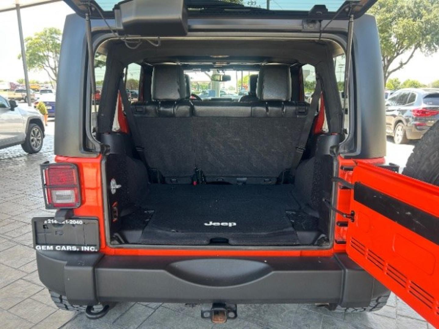2015 Orange /Black Leather Interior Jeep Wrangler Unlimited Sport 4WD (1C4BJWDG4FL) with an 3.6L V6 DOHC 24V FFV engine, 5-Speed Automatic transmission, located at 12182 Garland Rd, Dallas, TX, 75218, (214) 521-2040, 0.000000, 0.000000- Photo#6