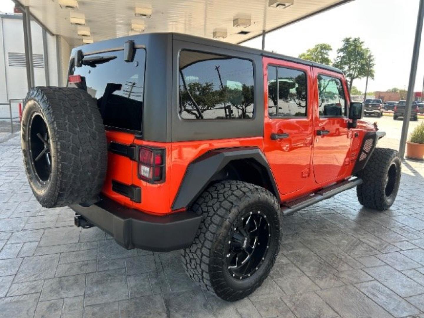 2015 Orange /Black Leather Interior Jeep Wrangler Unlimited Sport 4WD (1C4BJWDG4FL) with an 3.6L V6 DOHC 24V FFV engine, 5-Speed Automatic transmission, located at 12182 Garland Rd, Dallas, TX, 75218, (214) 521-2040, 0.000000, 0.000000- Photo#7