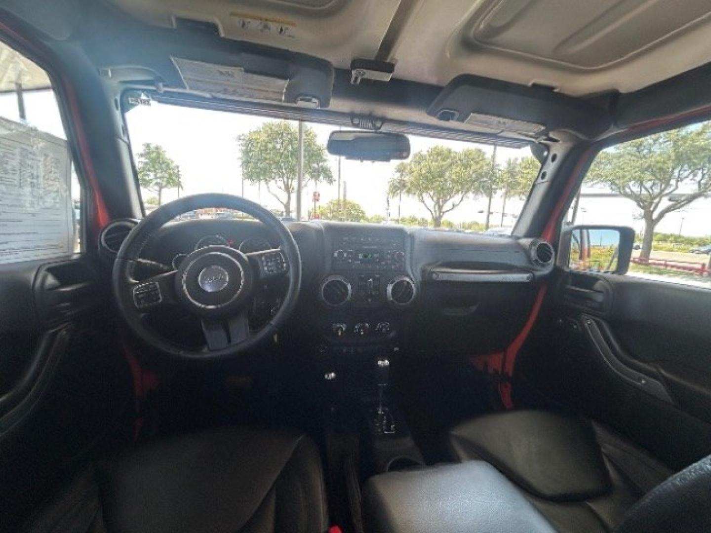 2015 Orange /Black Leather Interior Jeep Wrangler Unlimited Sport 4WD (1C4BJWDG4FL) with an 3.6L V6 DOHC 24V FFV engine, 5-Speed Automatic transmission, located at 12182 Garland Rd, Dallas, TX, 75218, (214) 521-2040, 0.000000, 0.000000- Photo#13
