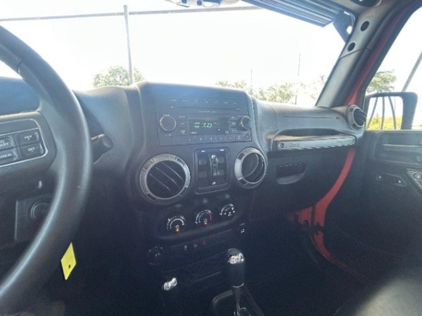 2015 Orange /Black Leather Interior Jeep Wrangler Unlimited Sport 4WD (1C4BJWDG4FL) with an 3.6L V6 DOHC 24V FFV engine, 5-Speed Automatic transmission, located at 12182 Garland Rd, Dallas, TX, 75218, (214) 521-2040, 0.000000, 0.000000- Photo#15