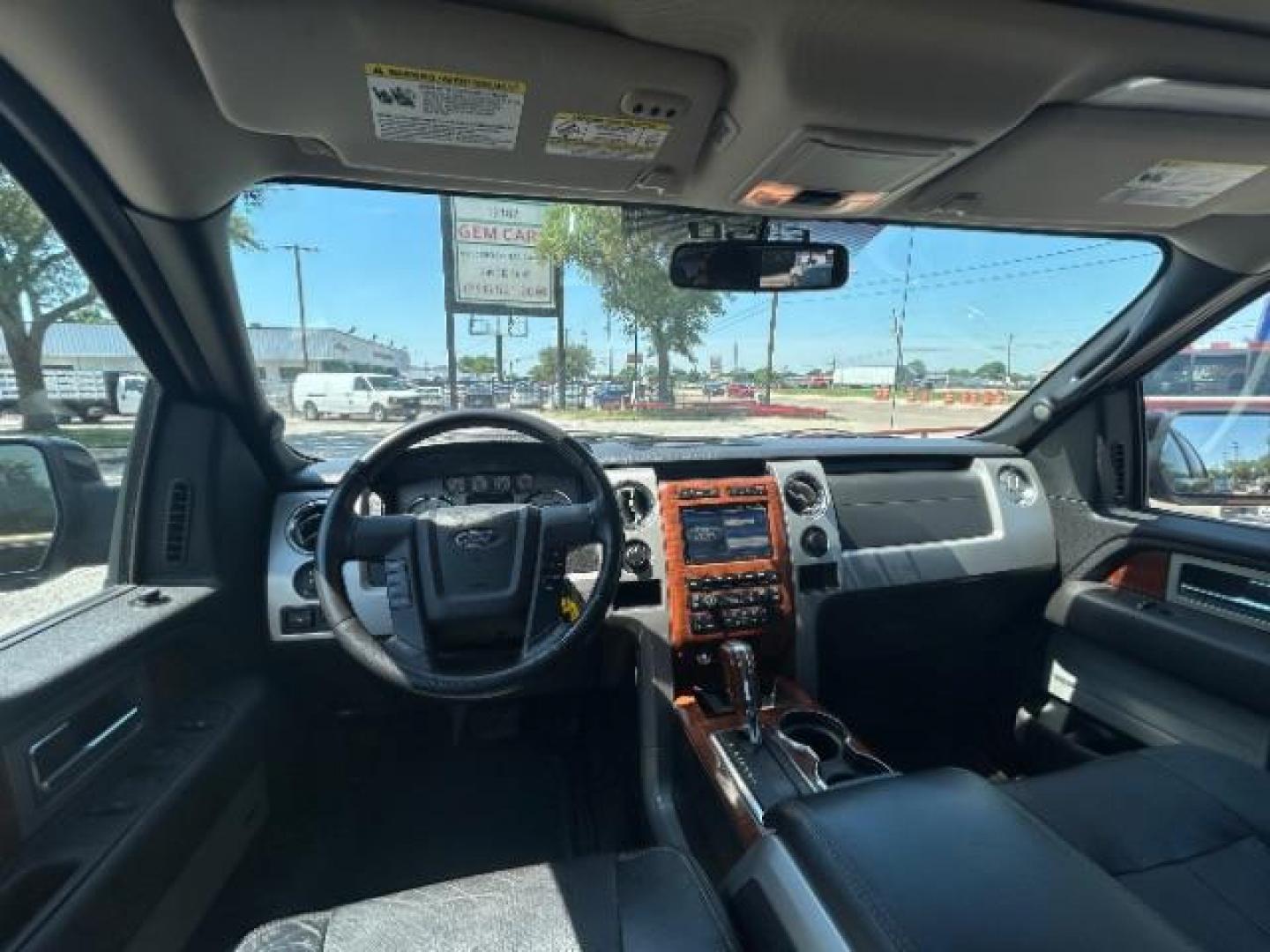 2010 Tuxedo Black Ford F-150 Lariat SuperCrew 5.5 (1FTFW1EV3AF) with an 5.4L V8 SOHC 24V FFV engine, located at 12182 Garland Rd, Dallas, TX, 75218, (214) 521-2040, 0.000000, 0.000000 - Photo#14