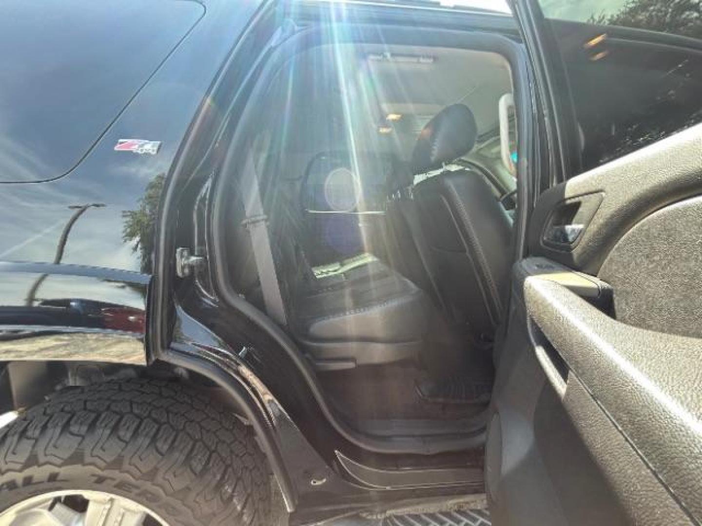 2013 Black Chevrolet Tahoe LT 4WD (1GNSKBE09DR) with an 5.3L V8 OHV 16V FFV engine, 6-Speed Automatic transmission, located at 12182 Garland Rd, Dallas, TX, 75218, (214) 521-2040, 0.000000, 0.000000 - Photo#10