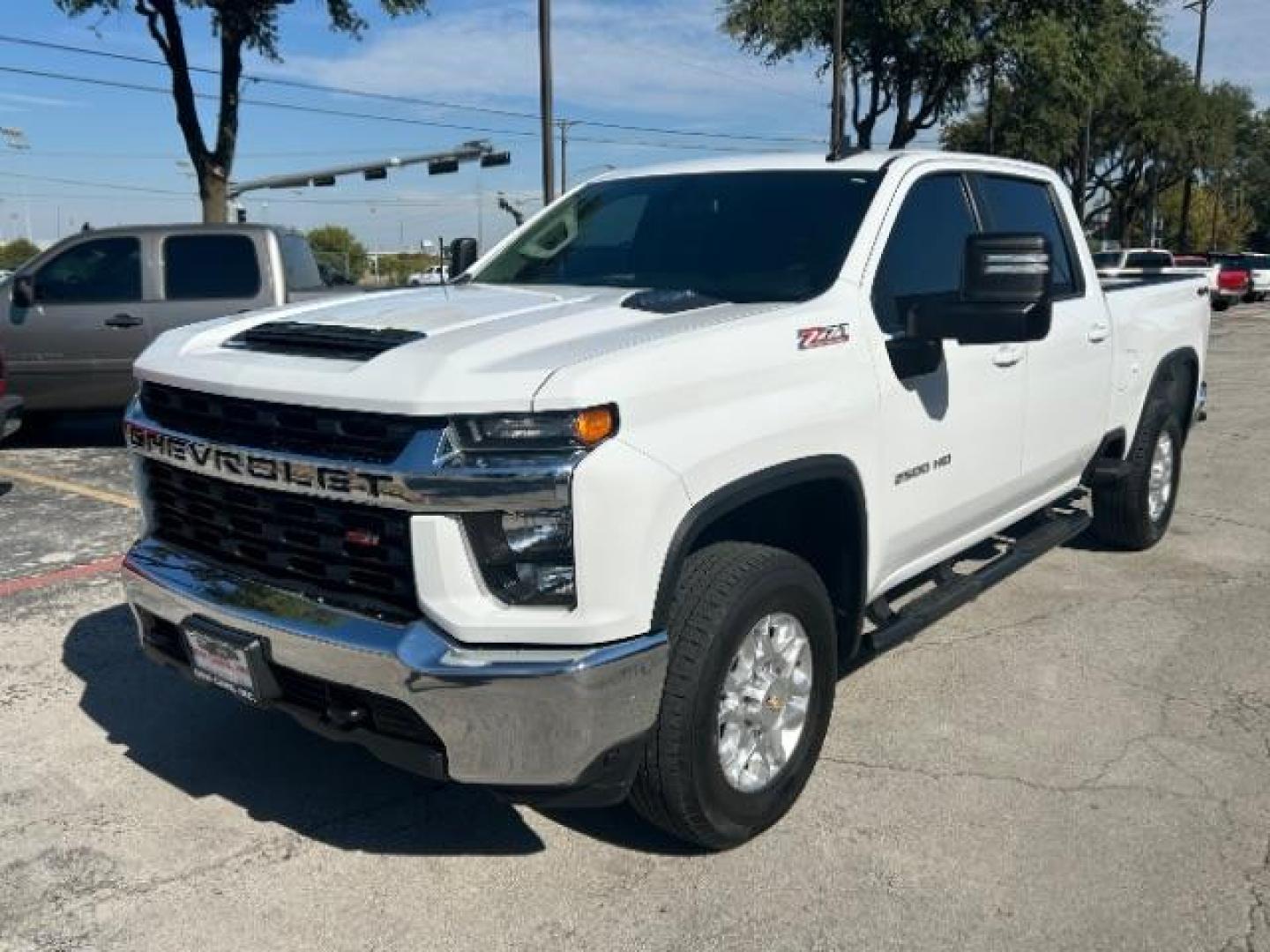 2021 White /Jet Black, cloth Chevrolet Silverado 2500HD LT Crew Cab Short Bo (1GC1YNEY9MF) with an 6.6L V8 OHV 16V DIES engine, 6-Speed Automatic transmission, located at 12182 Garland Rd, Dallas, TX, 75218, (214) 521-2040, 0.000000, 0.000000 - Photo#2