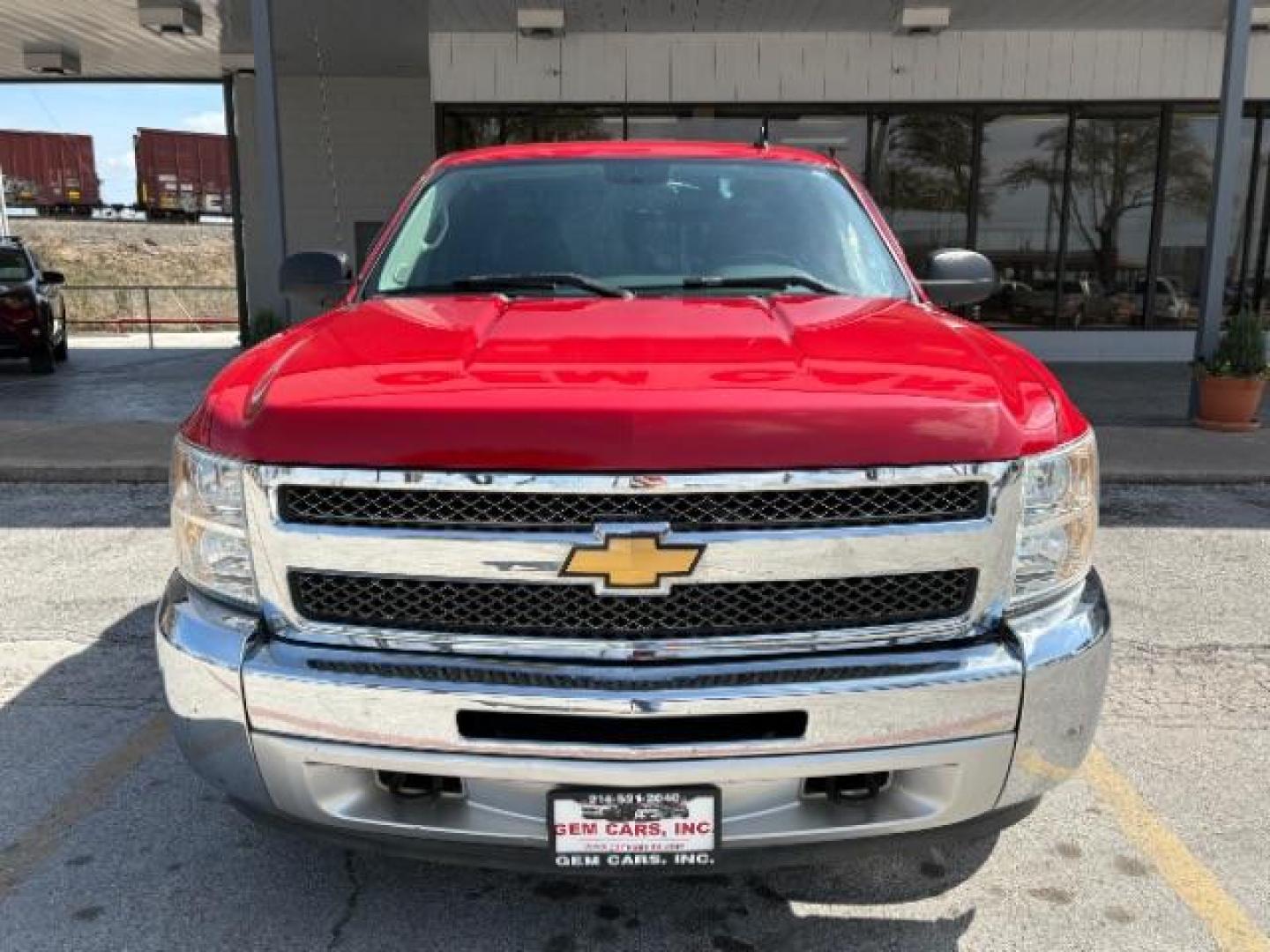 2013 Victory Red /Ebony Cloth Interior Chevrolet Silverado 1500 LT Ext. Cab 4WD (1GCRKSE78DZ) with an 5.3L V8 OHV 16V FFV engine, Automatic transmission, located at 12182 Garland Rd, Dallas, TX, 75218, (214) 521-2040, 0.000000, 0.000000 - Photo#1