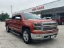 2015 Orange /Cocoa/Dune, leather Chevrolet Silverado 1500 LTZ Crew Cab 2WD (3GCPCSEC9FG) with an 5.3L V8 OHV 16V engine, 6-Speed Automatic transmission, located at 12182 Garland Rd, Dallas, TX, 75218, (214) 521-2040, 0.000000, 0.000000 - Photo#0