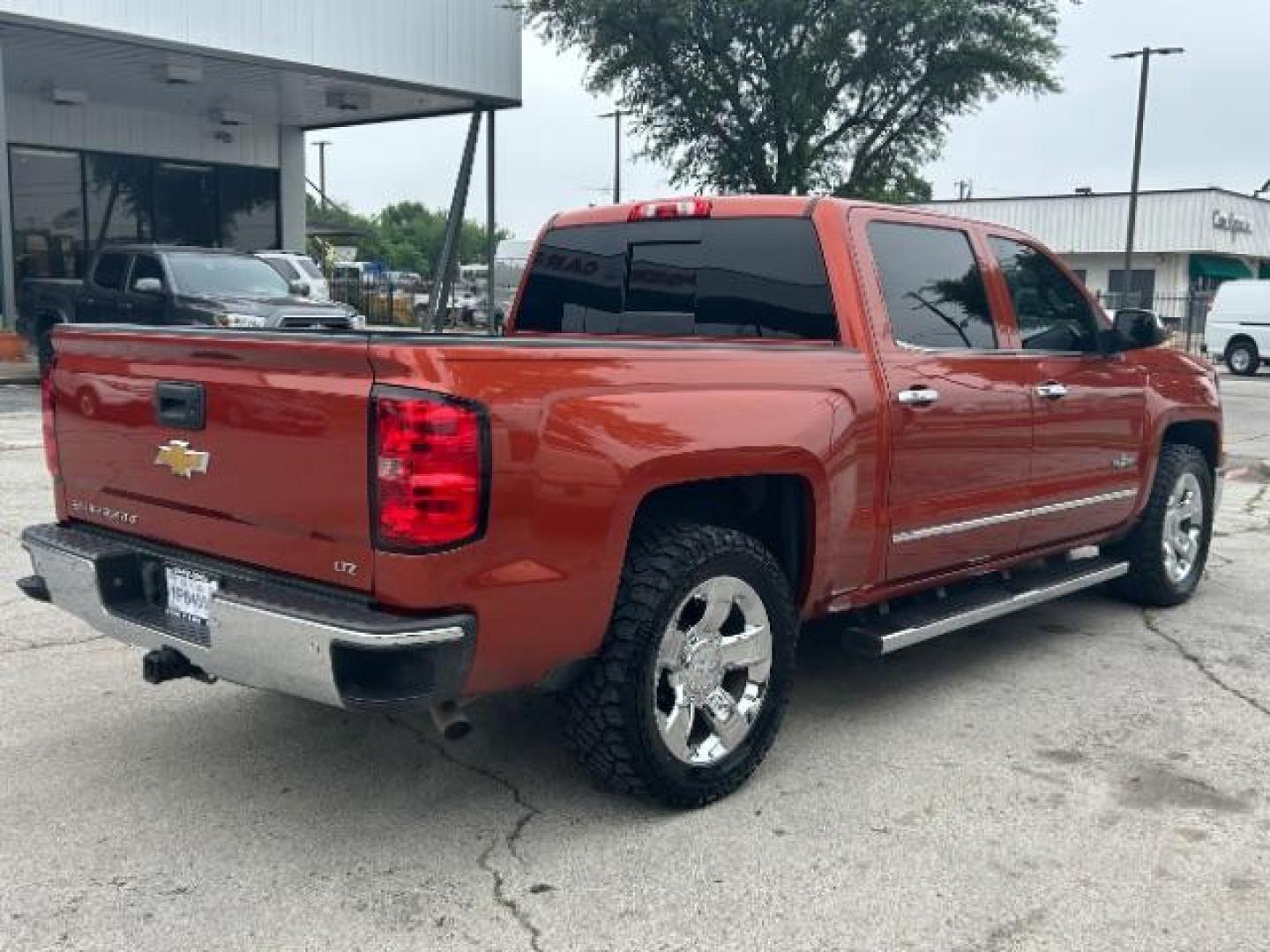 2015 Orange /Cocoa/Dune, leather Chevrolet Silverado 1500 LTZ Crew Cab 2WD (3GCPCSEC9FG) with an 5.3L V8 OHV 16V engine, 6-Speed Automatic transmission, located at 12182 Garland Rd, Dallas, TX, 75218, (214) 521-2040, 0.000000, 0.000000 - Photo#6