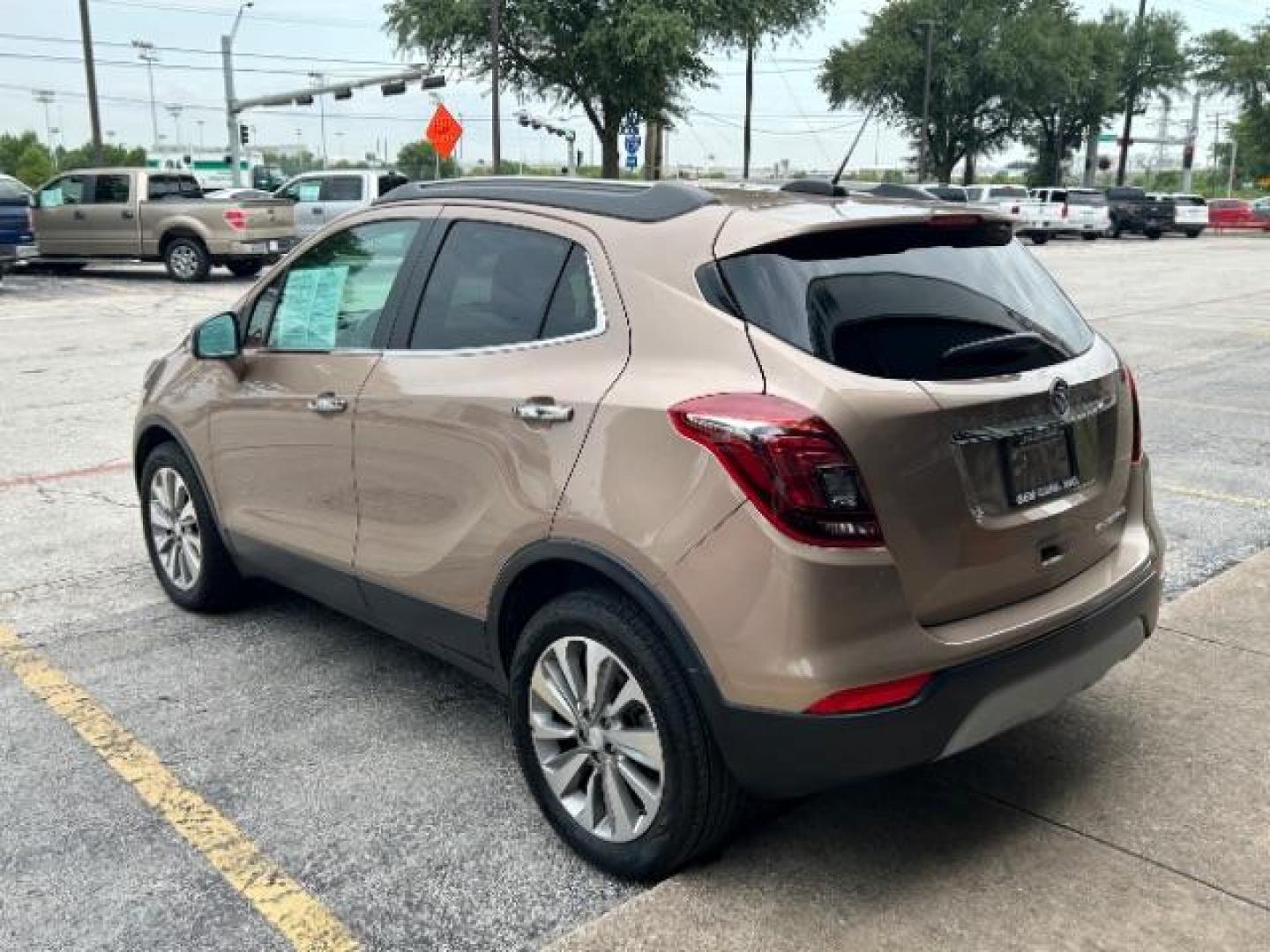 2019 Coppertino Metallic/Black Carbon Metallic /Ebony, leatherette/cloth Buick Encore Preferred FWD (KL4CJASBXKB) with an 1.4L L4 DOHC 16V TURBO engine, 6-Speed Automatic transmission, located at 12182 Garland Rd, Dallas, TX, 75218, (214) 521-2040, 0.000000, 0.000000 - Photo#4