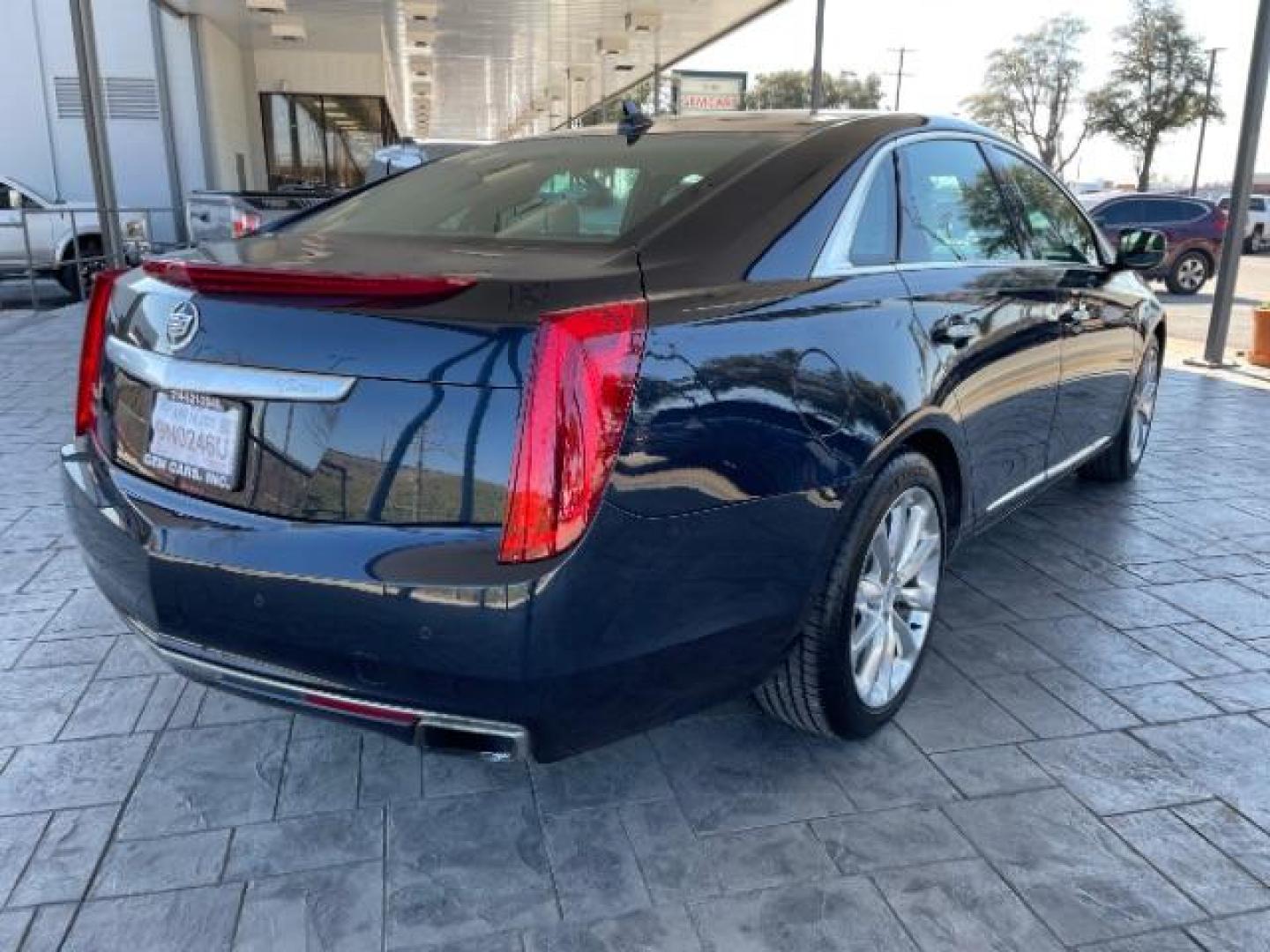 2014 Sapphire Blue Metall /Jet Black Cadillac XTS Luxury FWD (2G61M5S37E9) with an 3.6L V6 DOHC 24V engine, 6-Speed Automatic transmission, located at 12182 Garland Rd, Dallas, TX, 75218, (214) 521-2040, 0.000000, 0.000000 - Photo#5
