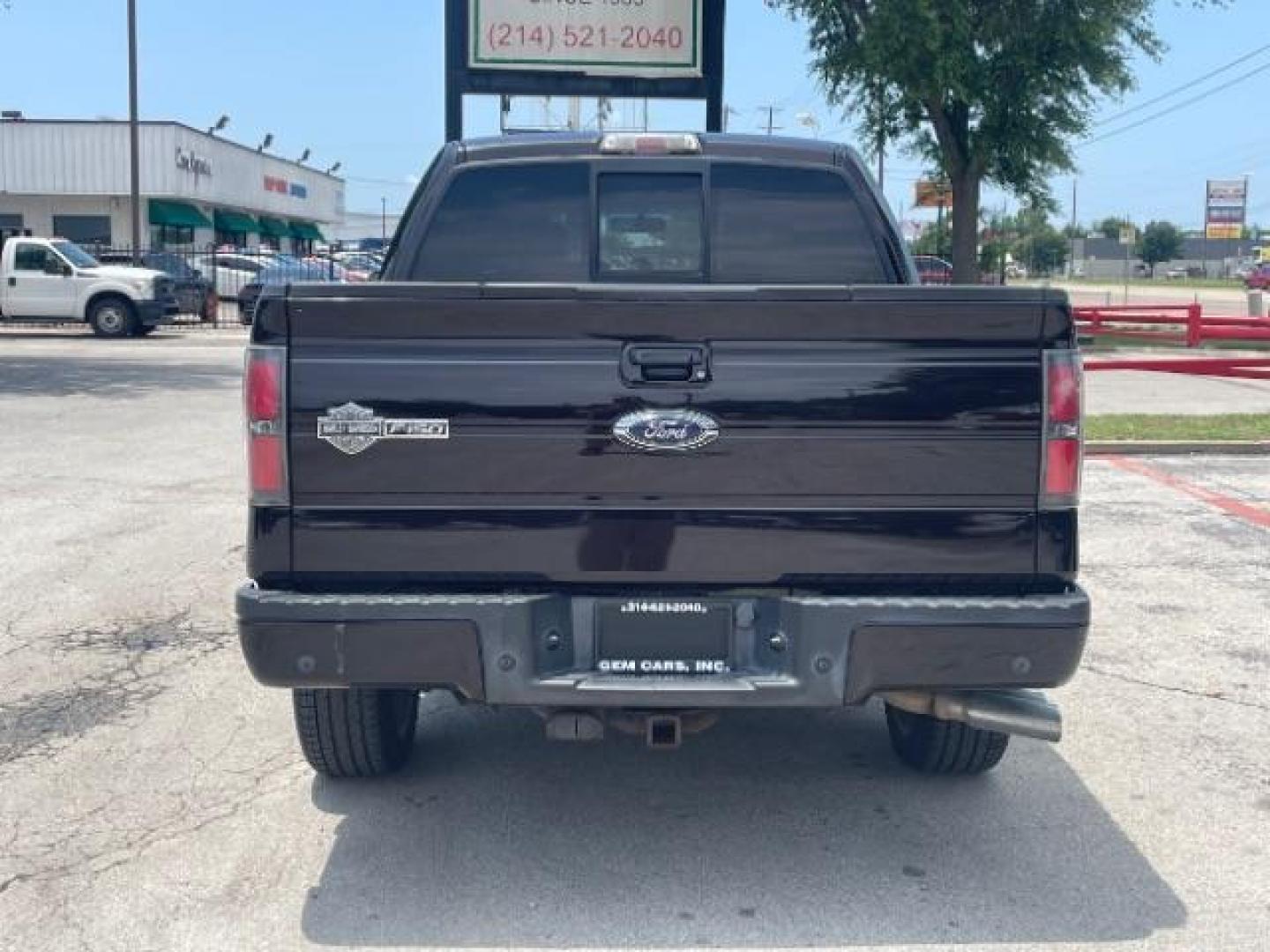 2010 Lava Metallic /Black and Red Leather Bucket Seats Ford F-150 Harley-Davidson (1FTEW1CV0AF) with an Triton 5.4L V-8 variable valve control engine, Automatic transmission, located at 12182 Garland Rd, Dallas, TX, 75218, (214) 521-2040, 0.000000, 0.000000 - Photo#5