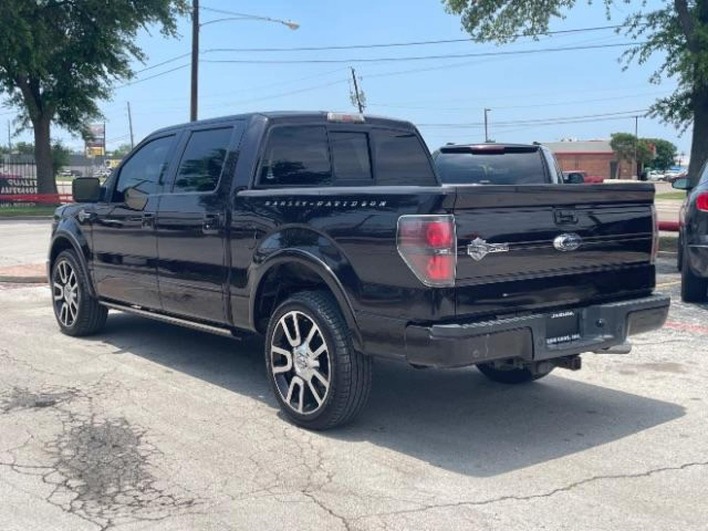 2010 Lava Metallic /Black and Red Leather Bucket Seats Ford F-150 Harley-Davidson (1FTEW1CV0AF) with an Triton 5.4L V-8 variable valve control engine, Automatic transmission, located at 12182 Garland Rd, Dallas, TX, 75218, (214) 521-2040, 0.000000, 0.000000 - Photo#6