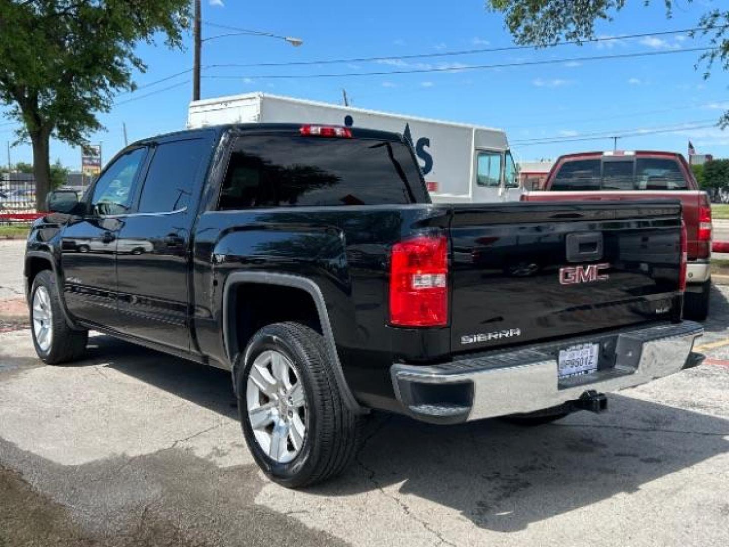 2015 Onyx Black GMC Sierra 1500 SLE (3GTP1UEC1FG) with an EcoTec3 4.3L V-6 gasoline direct injection engine, located at 12182 Garland Rd, Dallas, TX, 75218, (214) 521-2040, 0.000000, 0.000000 - Photo#4