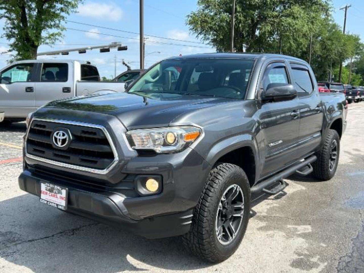 2016 Magnetic Gray Metallic Toyota Tacoma SR5 V6 | TRD Sport | TRD Off Road (3TMAZ5CN6GM) with an 3.5L V-6 port/direct injection engine, located at 12182 Garland Rd, Dallas, TX, 75218, (214) 521-2040, 0.000000, 0.000000 - Photo#2