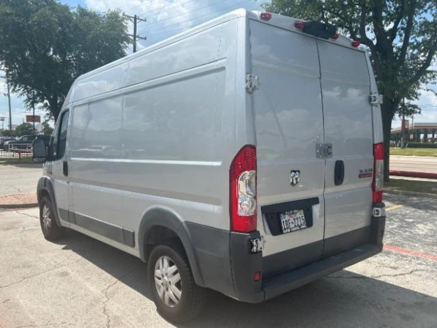 2018 Bright Silver Metallic Clearcoat /Black Ram ProMaster 2500 Cargo Van High Roof 136 WB (3C6TRVCG5JE) with an Pentastar 3.6L V-6 DOHC engine, Automatic transmission, located at 12182 Garland Rd, Dallas, TX, 75218, (214) 521-2040, 0.000000, 0.000000 - Photo#4