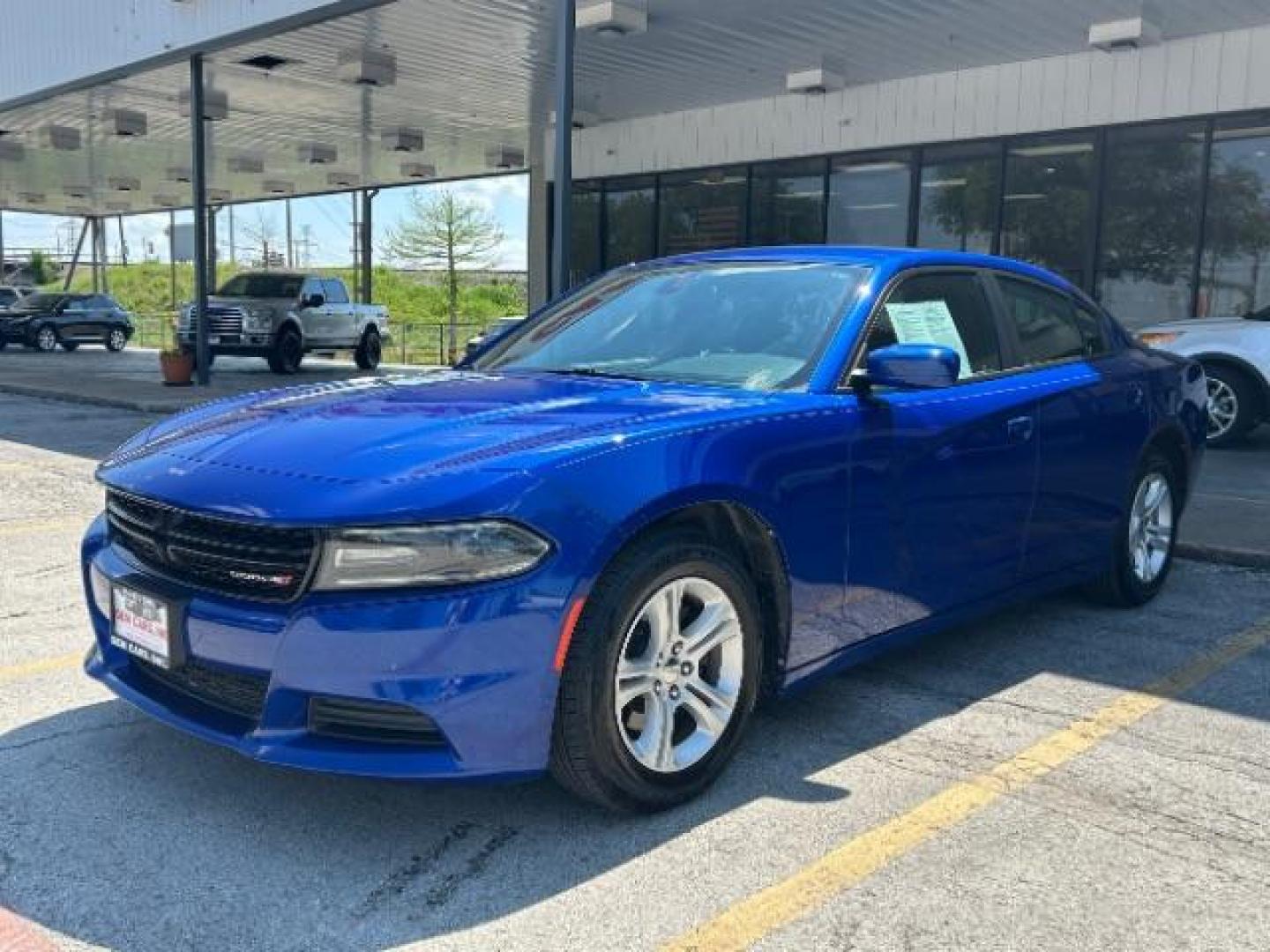 2019 B5 Blue Pearlcoat Dodge Charger SXT RWD (2C3CDXBG3KH) with an Pentastar 3.6L V-6 DOHC engine, located at 12182 Garland Rd, Dallas, TX, 75218, (214) 521-2040, 0.000000, 0.000000 - Photo#2