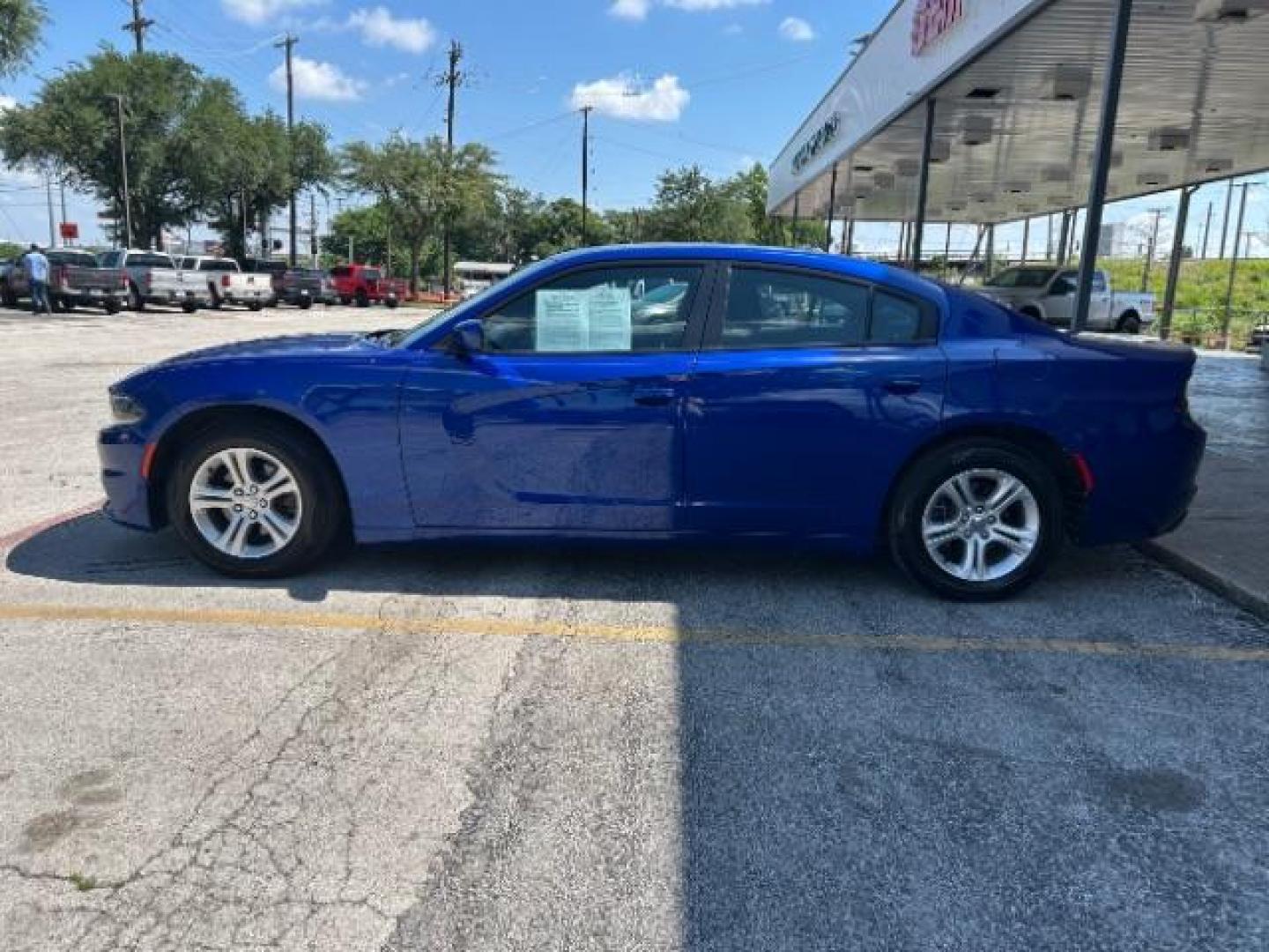 2019 B5 Blue Pearlcoat Dodge Charger SXT RWD (2C3CDXBG3KH) with an Pentastar 3.6L V-6 DOHC engine, located at 12182 Garland Rd, Dallas, TX, 75218, (214) 521-2040, 0.000000, 0.000000 - Photo#3