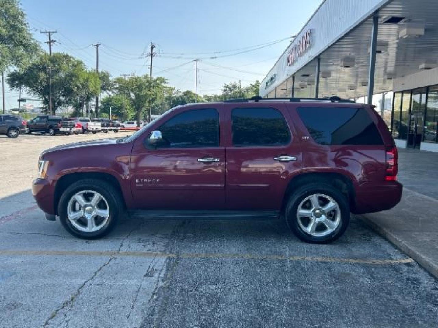 2008 Deep Ruby Metallic /Ebony Chevrolet Tahoe LTZ (1GNFC13068R) with an Vortec 5.3L V-8 regular unleaded engine, Automatic transmission, located at 12182 Garland Rd, Dallas, TX, 75218, (214) 521-2040, 0.000000, 0.000000 - Photo#3