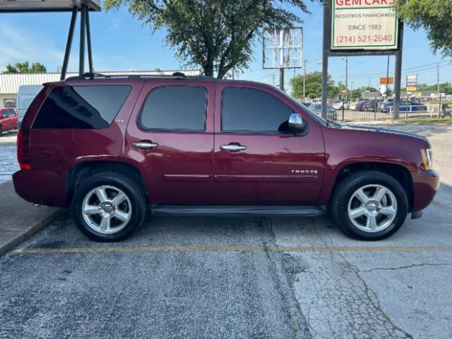 2008 Deep Ruby Metallic /Ebony Chevrolet Tahoe LTZ (1GNFC13068R) with an Vortec 5.3L V-8 regular unleaded engine, Automatic transmission, located at 12182 Garland Rd, Dallas, TX, 75218, (214) 521-2040, 0.000000, 0.000000 - Photo#8