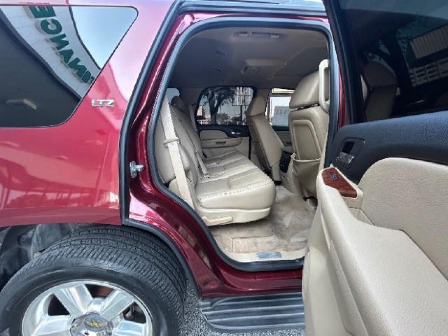 2008 Deep Ruby Metallic /Ebony Chevrolet Tahoe LTZ (1GNFC13068R) with an Vortec 5.3L V-8 regular unleaded engine, Automatic transmission, located at 12182 Garland Rd, Dallas, TX, 75218, (214) 521-2040, 0.000000, 0.000000 - Photo#10