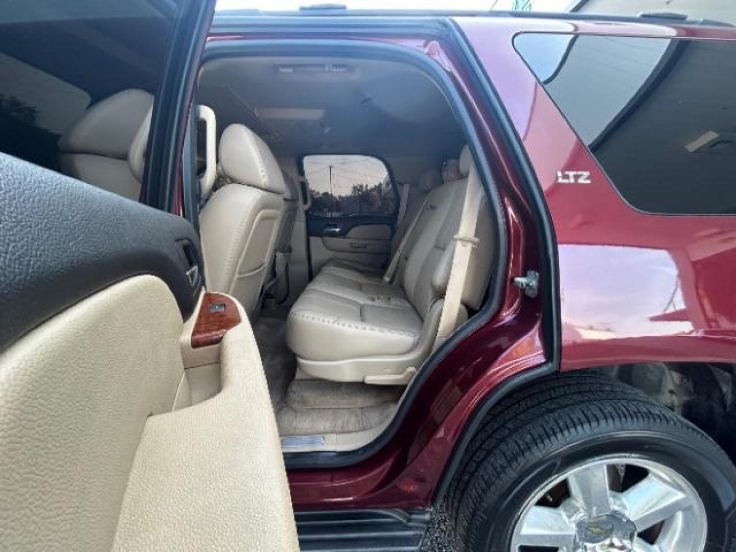 2008 Deep Ruby Metallic /Ebony Chevrolet Tahoe LTZ (1GNFC13068R) with an Vortec 5.3L V-8 regular unleaded engine, Automatic transmission, located at 12182 Garland Rd, Dallas, TX, 75218, (214) 521-2040, 0.000000, 0.000000 - Photo#12