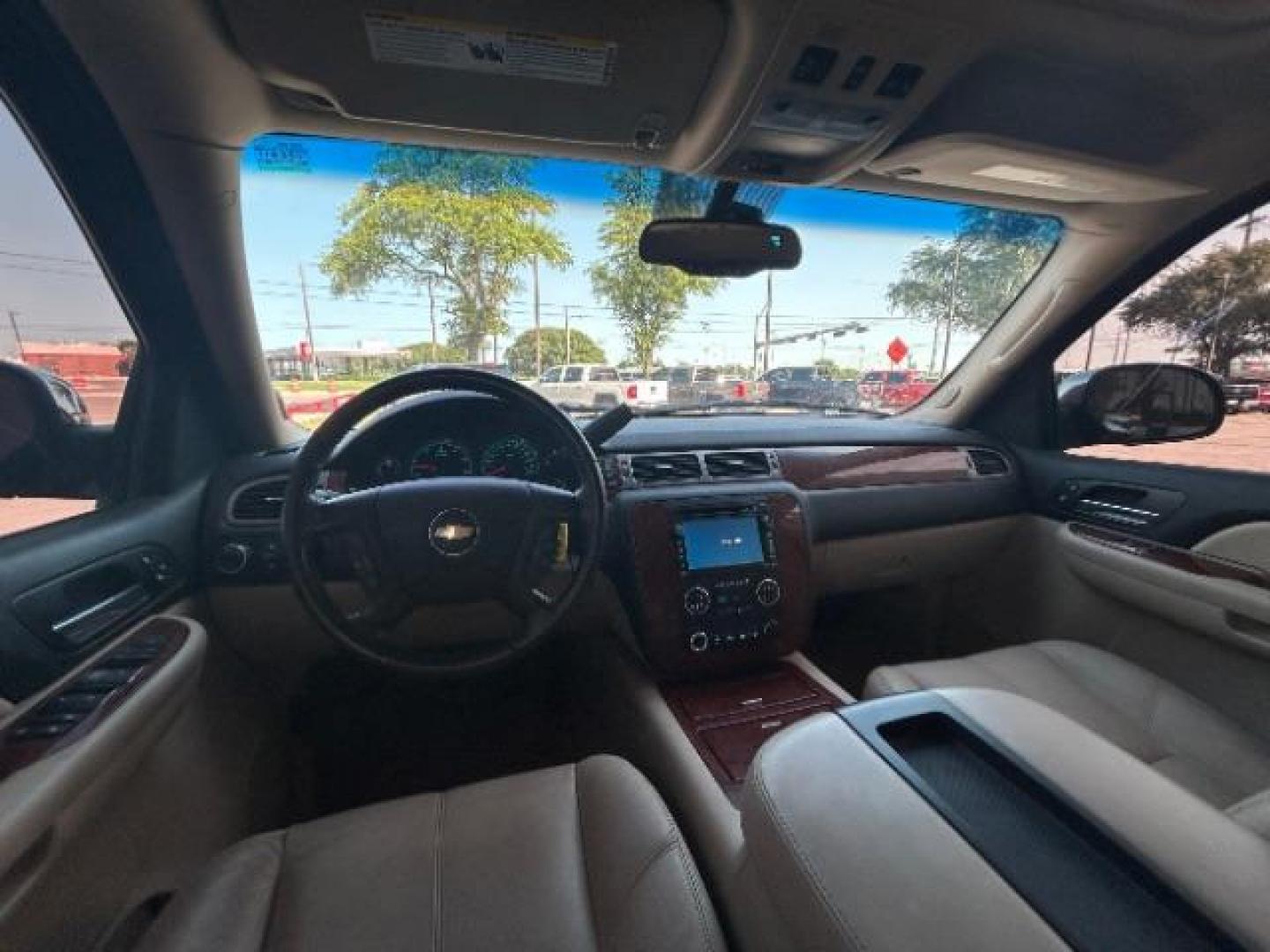 2008 Deep Ruby Metallic /Ebony Chevrolet Tahoe LTZ (1GNFC13068R) with an Vortec 5.3L V-8 regular unleaded engine, Automatic transmission, located at 12182 Garland Rd, Dallas, TX, 75218, (214) 521-2040, 0.000000, 0.000000 - Photo#13