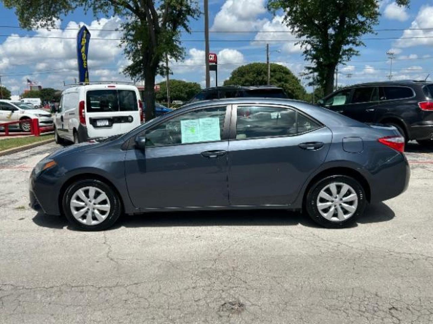2015 Slate Metallic Toyota Corolla LE (5YFBURHE6FP) with an 1.8L I-4 DOHC engine, located at 12182 Garland Rd, Dallas, TX, 75218, (214) 521-2040, 0.000000, 0.000000 - Photo#3