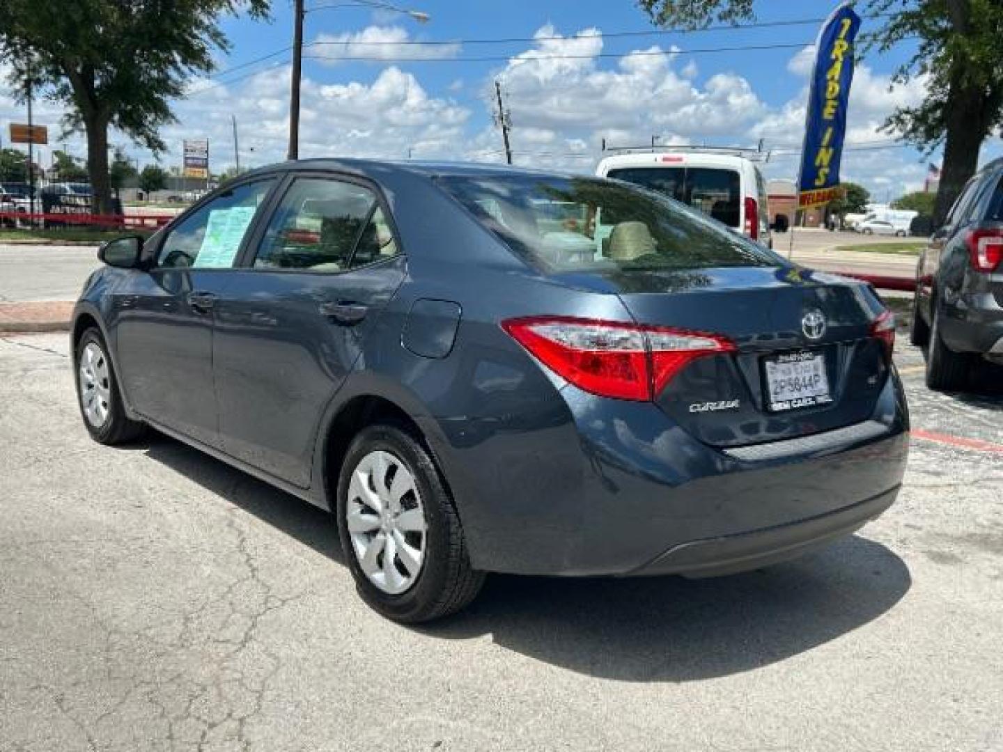 2015 Slate Metallic Toyota Corolla LE (5YFBURHE6FP) with an 1.8L I-4 DOHC engine, located at 12182 Garland Rd, Dallas, TX, 75218, (214) 521-2040, 0.000000, 0.000000 - Photo#4