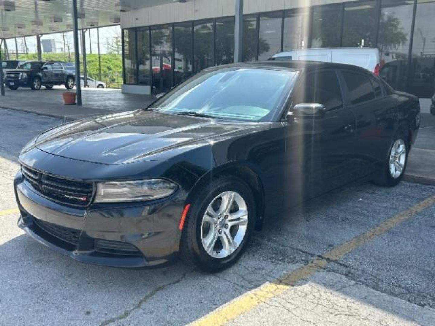 2019 Pitch Black Clearcoat Dodge Charger SXT RWD (2C3CDXBG8KH) with an Pentastar 3.6L V-6 DOHC engine, located at 12182 Garland Rd, Dallas, TX, 75218, (214) 521-2040, 0.000000, 0.000000 - Photo#2