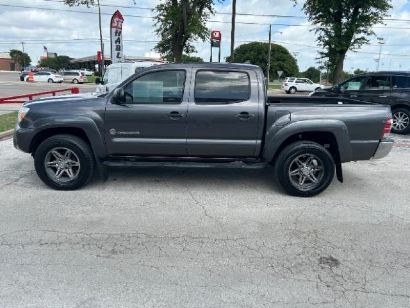 2012 Black Toyota Tacoma PreRunner V6 (5TFJU4GN4CX) with an 4L V-6 DOHC engine, located at 12182 Garland Rd, Dallas, TX, 75218, (214) 521-2040, 0.000000, 0.000000 - Photo#3