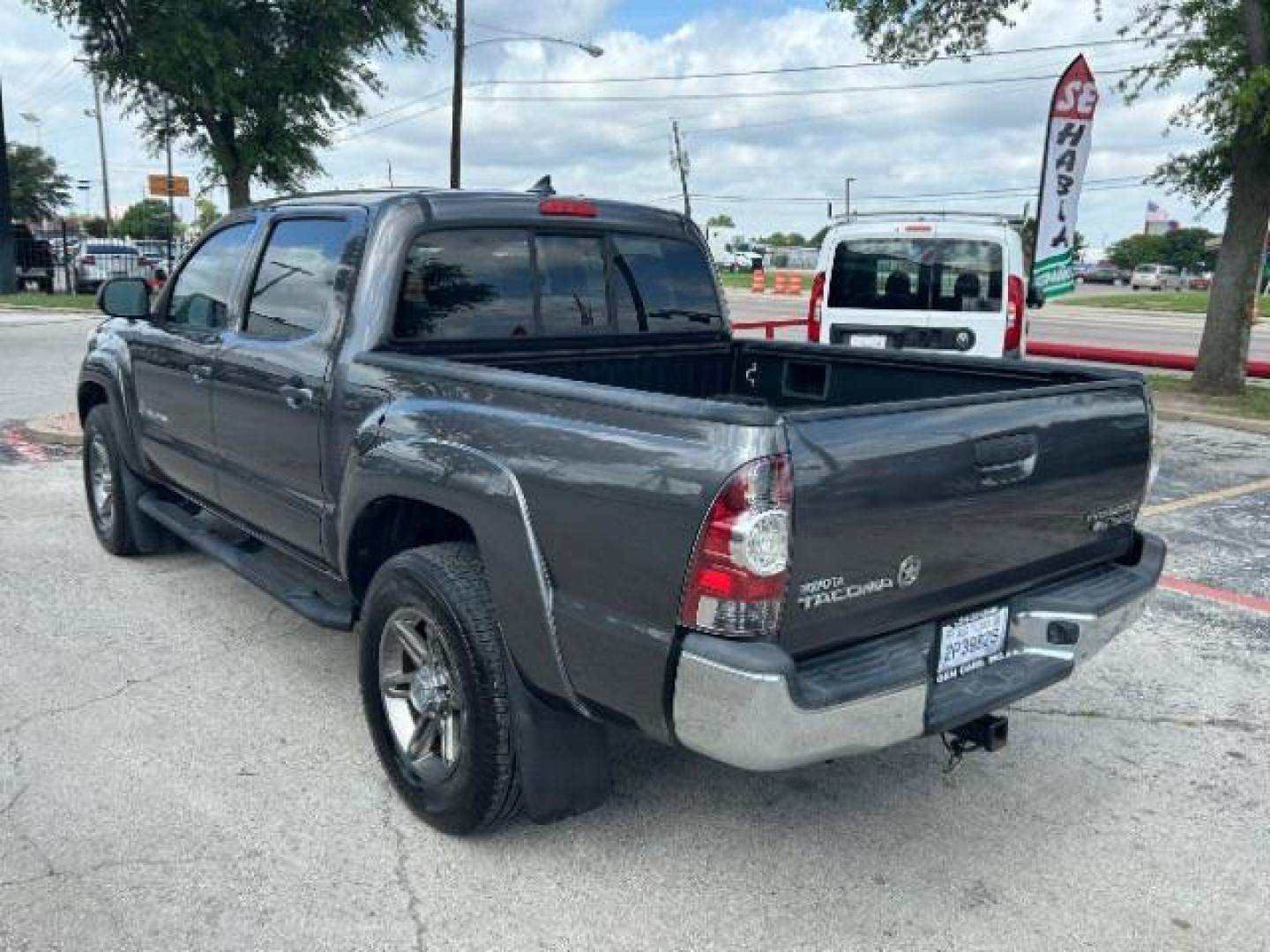 2012 Black Toyota Tacoma PreRunner V6 (5TFJU4GN4CX) with an 4L V-6 DOHC engine, located at 12182 Garland Rd, Dallas, TX, 75218, (214) 521-2040, 0.000000, 0.000000 - Photo#4