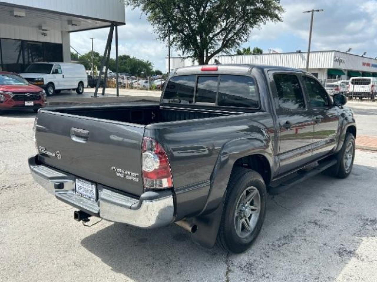 2012 Black Toyota Tacoma PreRunner V6 (5TFJU4GN4CX) with an 4L V-6 DOHC engine, located at 12182 Garland Rd, Dallas, TX, 75218, (214) 521-2040, 0.000000, 0.000000 - Photo#6
