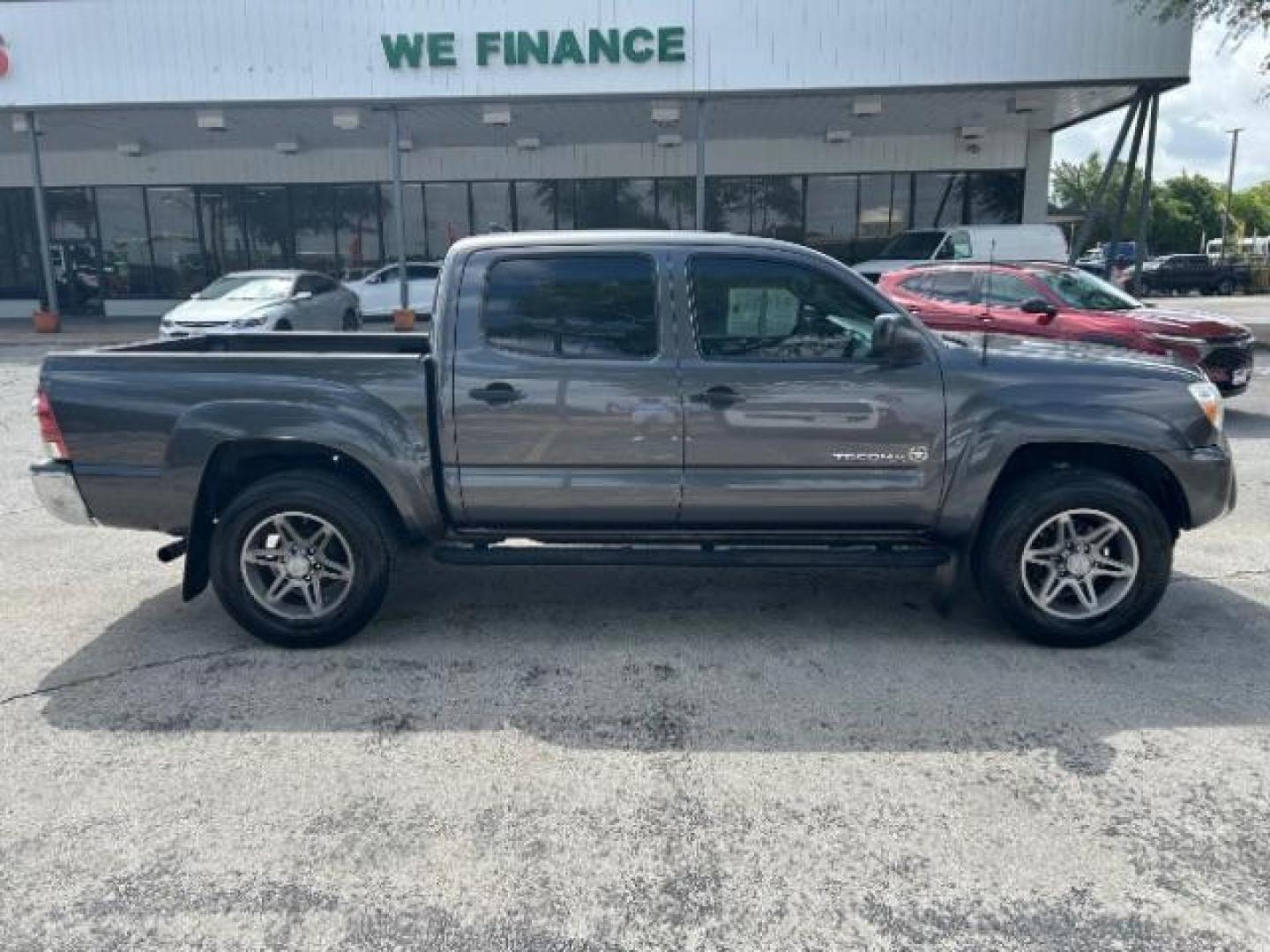 2012 Black Toyota Tacoma PreRunner V6 (5TFJU4GN4CX) with an 4L V-6 DOHC engine, located at 12182 Garland Rd, Dallas, TX, 75218, (214) 521-2040, 0.000000, 0.000000 - Photo#7