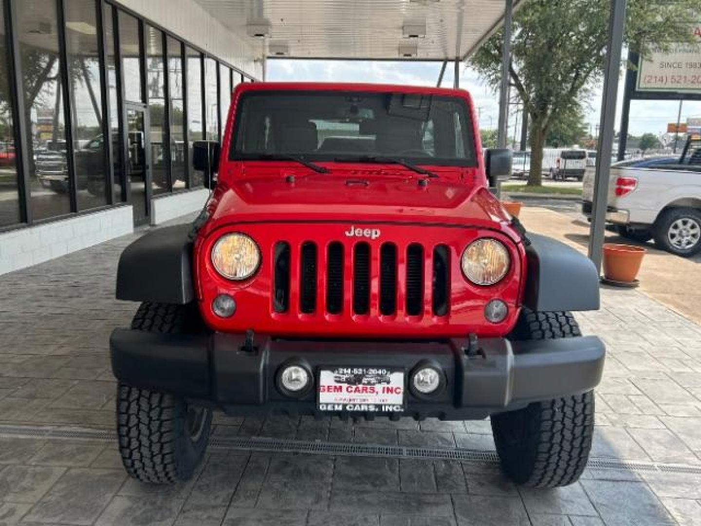 2015 Firecracker Red Clear Coat Jeep Wrangler Unlimited Sport 4WD (1C4HJWDG1FL) with an 3.6L V6 DOHC 24V FFV engine, located at 12182 Garland Rd, Dallas, TX, 75218, (214) 521-2040, 0.000000, 0.000000 - Photo#1