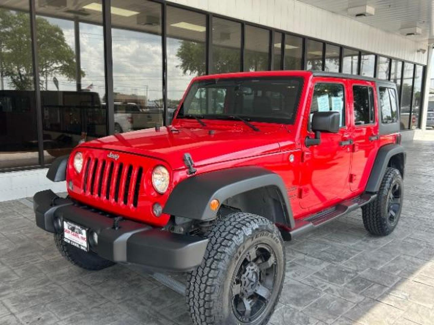 2015 Firecracker Red Clear Coat Jeep Wrangler Unlimited Sport 4WD (1C4HJWDG1FL) with an 3.6L V6 DOHC 24V FFV engine, located at 12182 Garland Rd, Dallas, TX, 75218, (214) 521-2040, 0.000000, 0.000000 - Photo#2