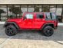 2015 Firecracker Red Clear Coat Jeep Wrangler Unlimited Sport 4WD (1C4HJWDG1FL) with an 3.6L V6 DOHC 24V FFV engine, located at 12182 Garland Rd, Dallas, TX, 75218, (214) 521-2040, 0.000000, 0.000000 - Photo#3