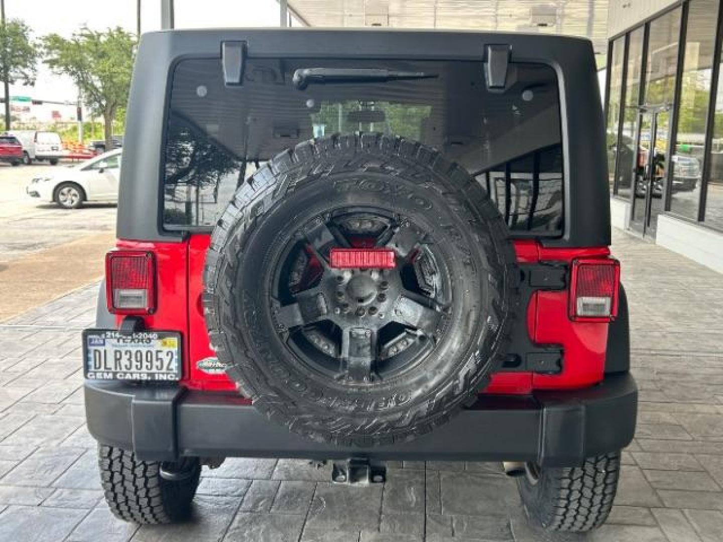 2015 Firecracker Red Clear Coat Jeep Wrangler Unlimited Sport 4WD (1C4HJWDG1FL) with an 3.6L V6 DOHC 24V FFV engine, located at 12182 Garland Rd, Dallas, TX, 75218, (214) 521-2040, 0.000000, 0.000000 - Photo#5