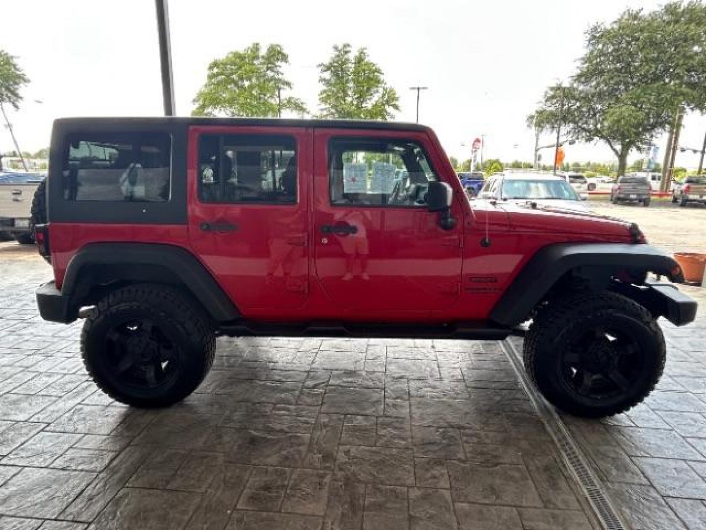 2015 Firecracker Red Clear Coat Jeep Wrangler Unlimited Sport 4WD (1C4HJWDG1FL) with an 3.6L V6 DOHC 24V FFV engine, located at 12182 Garland Rd, Dallas, TX, 75218, (214) 521-2040, 0.000000, 0.000000 - Photo#7