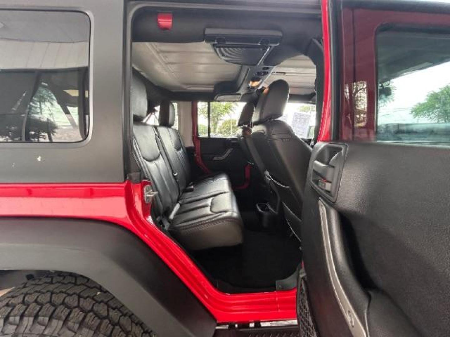 2015 Firecracker Red Clear Coat Jeep Wrangler Unlimited Sport 4WD (1C4HJWDG1FL) with an 3.6L V6 DOHC 24V FFV engine, located at 12182 Garland Rd, Dallas, TX, 75218, (214) 521-2040, 0.000000, 0.000000 - Photo#9