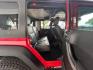 2015 Firecracker Red Clear Coat Jeep Wrangler Unlimited Sport 4WD (1C4HJWDG1FL) with an 3.6L V6 DOHC 24V FFV engine, located at 12182 Garland Rd, Dallas, TX, 75218, (214) 521-2040, 0.000000, 0.000000 - Photo#9