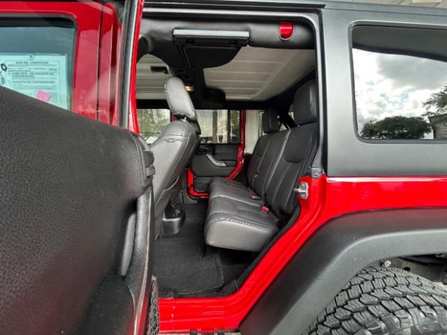 2015 Firecracker Red Clear Coat Jeep Wrangler Unlimited Sport 4WD (1C4HJWDG1FL) with an 3.6L V6 DOHC 24V FFV engine, located at 12182 Garland Rd, Dallas, TX, 75218, (214) 521-2040, 0.000000, 0.000000 - Photo#11