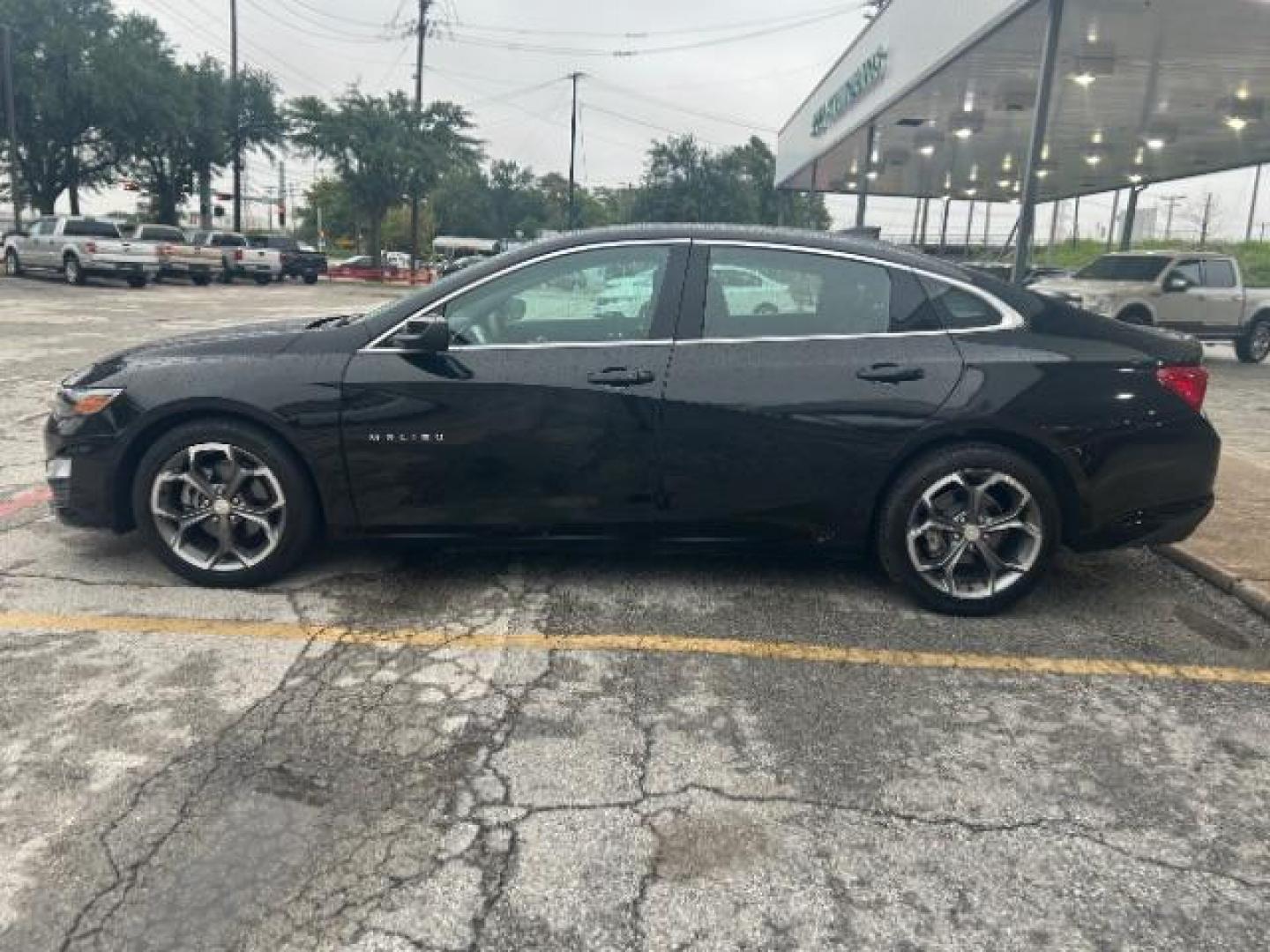 2024 Mosaic Black Metallic /Jet Black Chevrolet Malibu FWD 1LT (1G1ZD5ST7RF) with an ECOTEC 1.5L I-4 gasoline direct injection engine, located at 12182 Garland Rd, Dallas, TX, 75218, (214) 521-2040, 0.000000, 0.000000 - Photo#3